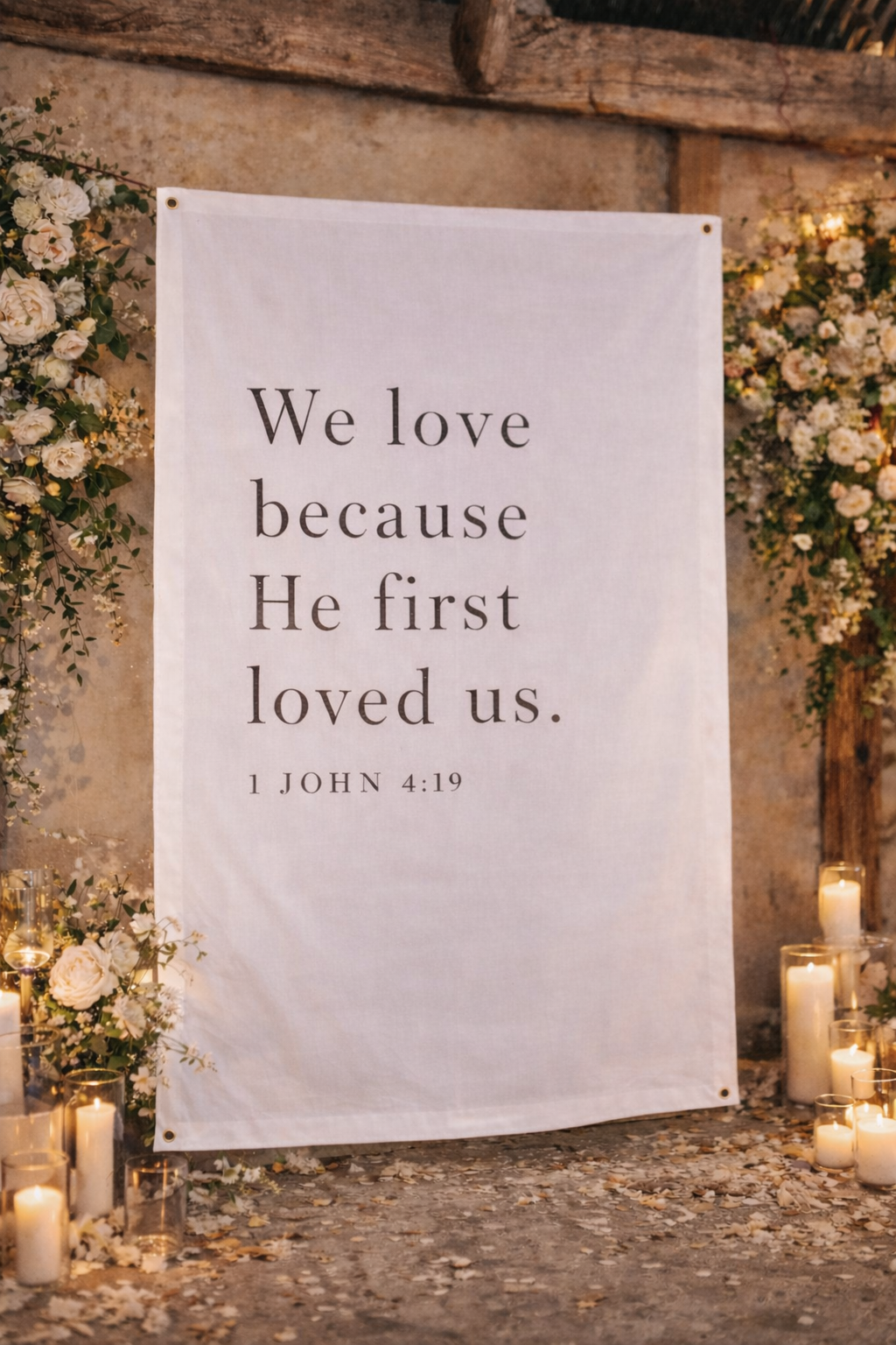 Decorative banner with inspirational quote surrounded by flowers and candles.
