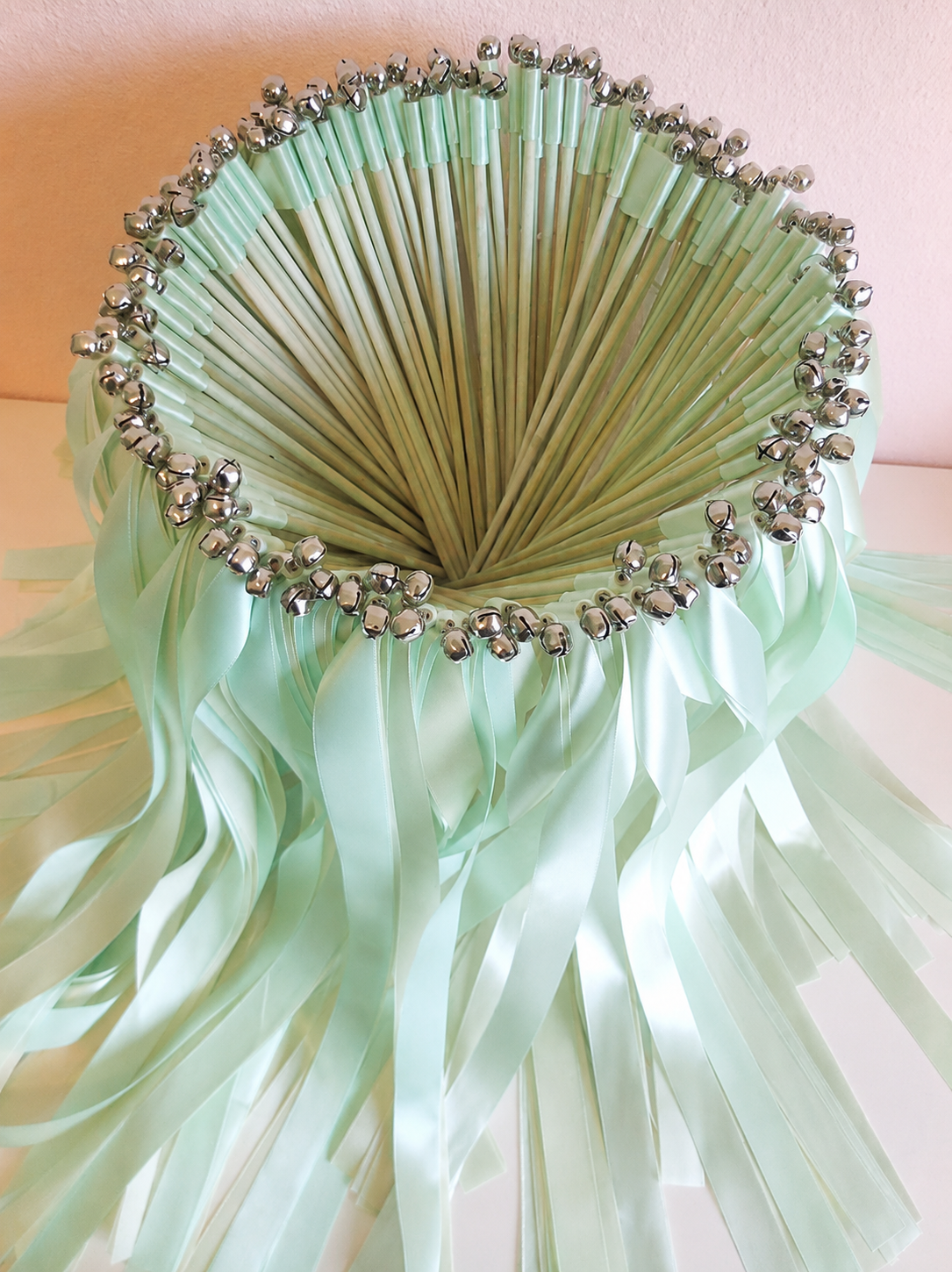 Handmade Soft Mint Green Ribbon Wands with Silver Bells for Spring Wedding Send-Off